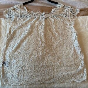 Cream lace top with capped sleeves
